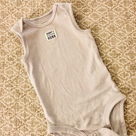 white sleeveless onesie
